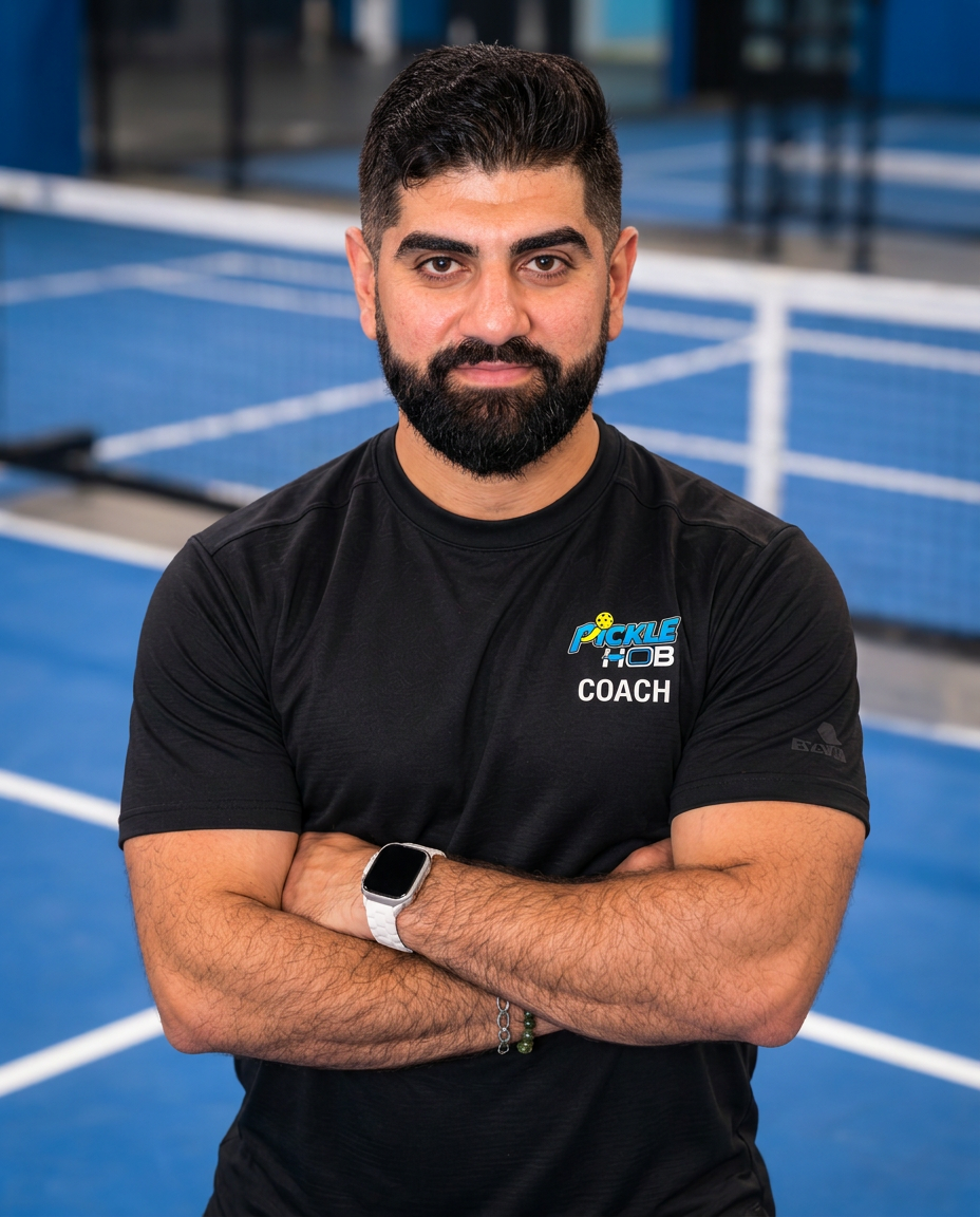 PickleHub pro Hassan Attar on an indoor pickleball court